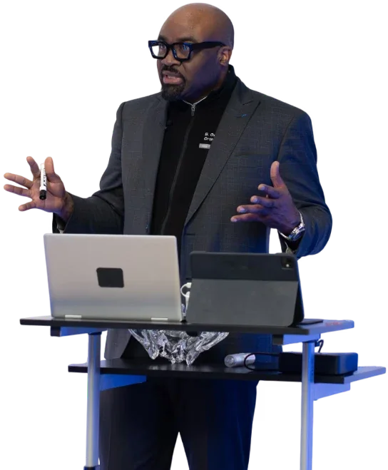 Dr. Babajide Ogunseinde speaking at the PML Mastery conference